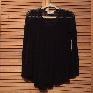 Black long sleeve with lace detail.
